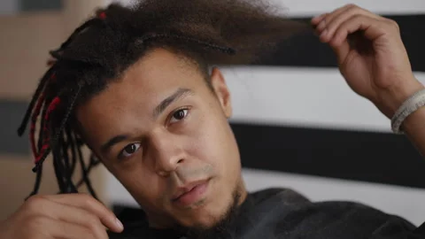 Experience Stylish Barber Session Featuring a Dramatic Dreadlocks Transformation Stock Footage 312316166