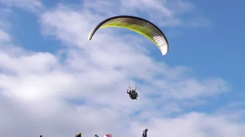 Experience the thrill of tandem paragliding in Banos,Ecuador,a popular tourist Stock Footage 59210050