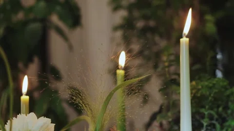 Experience a tranquil candlelit atmosphere enhanced beautifully with various Stock Footage 307757141
