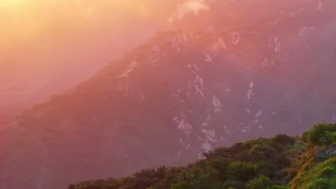 Experience tranquility with Serene Flight A Kite at Sunset and feel freedom 스톡 동영상 280514940