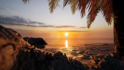 Experience the Ultimate Beach Getaway with Stunning Sunrise Views Stock Footage 234309637