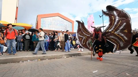 Experience the vibrant Diablada de Pillaro in Pillaro,Ecuador,as devil like Stock Footage 128427642