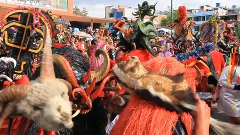 Experience the vibrant Diablada de Pillaro in Pillaro,Ecuador,as devil like Stock Footage 128427719