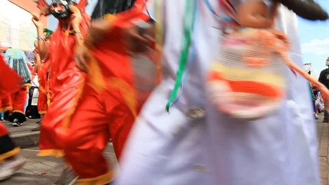 Experience the vibrant Diablada de Pillaro in Pillaro,Ecuador,as devil like Stock Footage 128427722