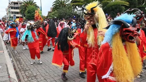 Experience the vibrant Diablada de Pillaro in Pillaro,Ecuador,as devil like Stock Footage 128427873