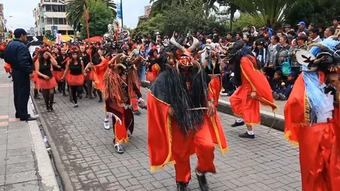 Experience the vibrant Diablada de Pillaro in Pillaro,Ecuador,as devil like Stock Footage 128427874