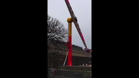 Experience vibrant lights and art at Garden Tuileries during the evening Stock Footage 297468602