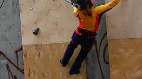 An experienced climber climbs the mountain. Fast shooting. Motivation. Success. Stock Footage 69033653