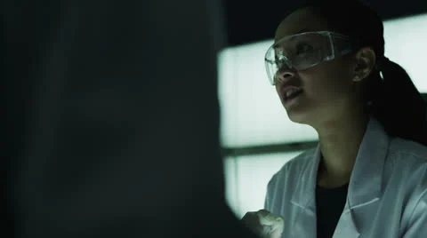 Experienced doctor working in the lab with young medical research students Stock Footage