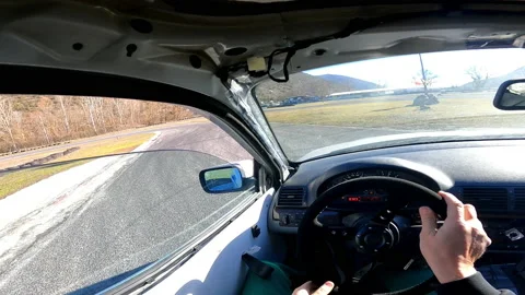 Experienced driver making abrupt u-turn drifting technique on training Stock Footage 230161126