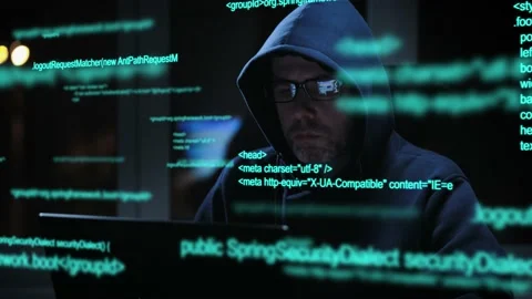An experienced hacker works with code when breaking into security systems. A Stock Footage 182291894