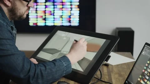 An experienced interior designer creates style for modern apartments. A man Stock Footage 177301463