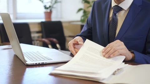 Experienced lawyer working on document in cozy office. Video stock 101805218