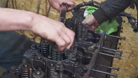An experienced mechanic cleans the truck engine Stock Footage 105281285