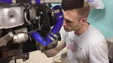 Experienced mechanic inspect the car engine Stock Footage 68012419