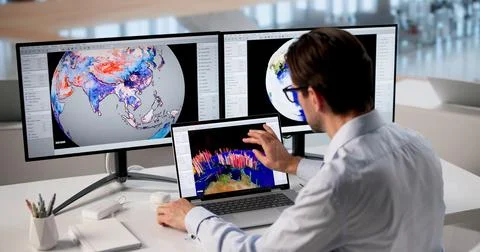 Experienced Meteorologist Analyzes Computer Data To Predict Weather And Clima Stock Photos
