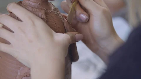 Experienced potter creating a beautiful clay souvenirs using professional tools Stock-Footage 83648083