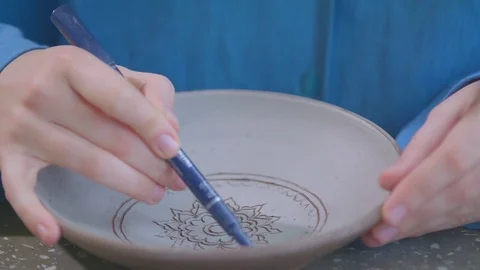 Experienced potter creating a beautiful clay souvenirs using professional tools 스톡 동영상 84170703