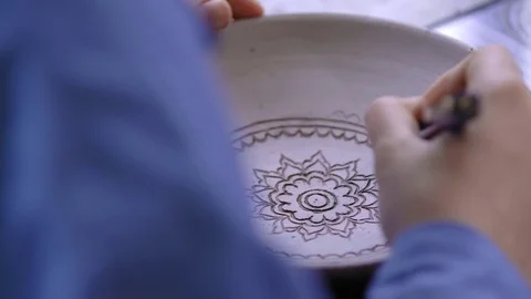 Experienced potter creating a beautiful clay souvenirs using professional tools 스톡 동영상 84180507