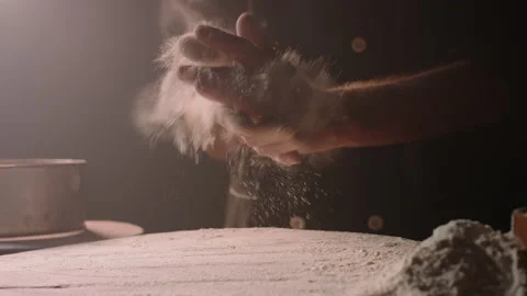 Experienced professional chef getting rid of flour on his hands, starting to Vídeo Stock 133125239