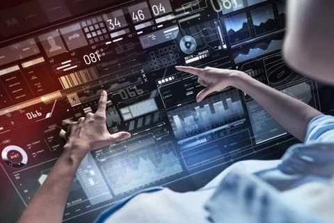 Experienced professional programmer pointing to the screen with two fingers Stock-Fotos