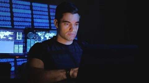 Experienced Programmer Developer works on a new program Young man writes the Stock Footage 102899171