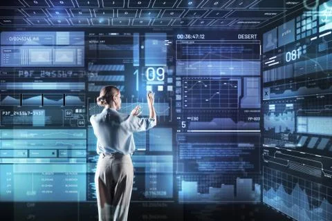 Experienced programmer feeling good while working with a giant computer Stock-Fotos