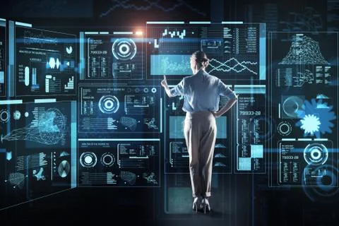 Experienced programmer pointing to the screen and looking elegant Stock Photos