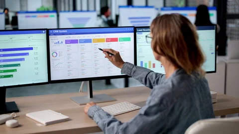 Experienced Sales Manager Using CRM Software Stock Footage 336371896