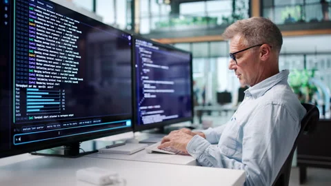 Experienced Software Developer Coding Remotely Video stock 345319679