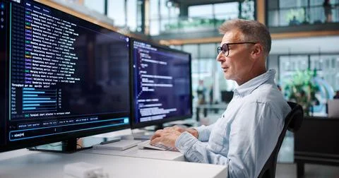 Experienced Software Developer Coding Remotely On Cloud-based IDE Workspace. Stock Photos