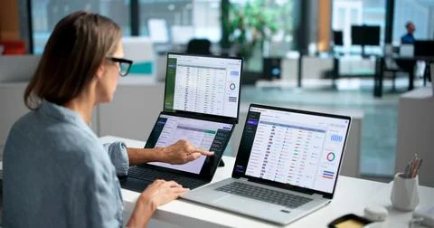 Experienced Software Developer Writes Code On Dual Touchscreen Laptops, Colla Fotos Stock