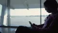 Experienced traveler planning route in smartphone application before departure HD Footage