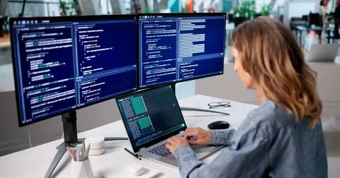 Experienced Woman Writes Software Code Using Cloud-based Online Development T Fotos Stock