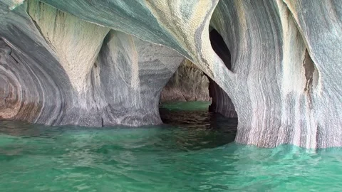 Experiencing the magic of Marble Caves at sunrise in Patagonia Stock Footage 314065310