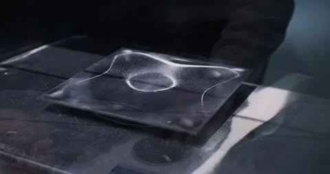 An experiment with the movement of sand under the influence of sound vibration Stock Footage 237190818