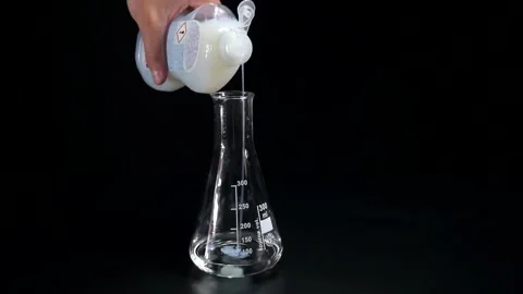 Experiment with potassium iodide hydrogen peroxide, food colors and dishwasher Stock Footage 157750568