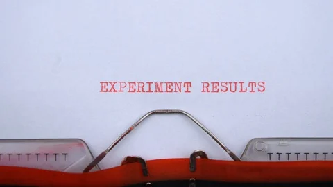 Experiment results - phrase printed on an old typewriter in red letters Stock-Footage 128400648