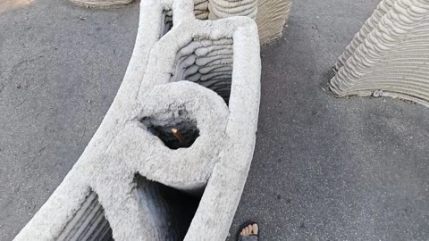 Experimental 3D printed concrete wall with hollow structural geometry Stock Footage 346415598