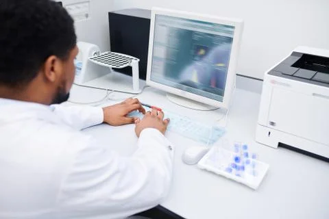 Experimental scientist recording data 스톡 사진