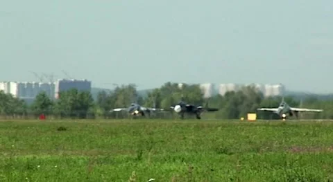 Experimental Su-47 Berkut, Su-30SM and Su-35 are moving along runway Stock Footage 196152630