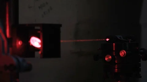 Experiments with a laser system in the laboratory. Laser cutting machine Stock Footage 73710803