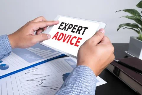 Expert Advice concept, man using tablet computer Stock-Fotos