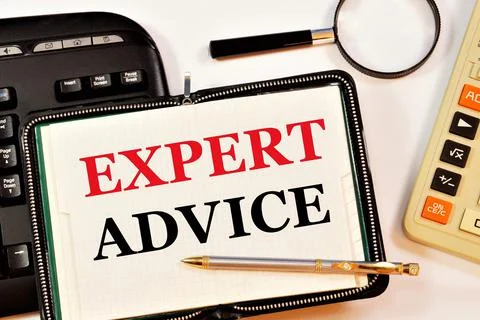 Expert advice. Text label on the notepad. Stock Photos