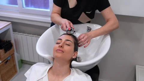 Expert Applying Stem Cell Treatment for Hair Revitalization Stock Footage 271353337