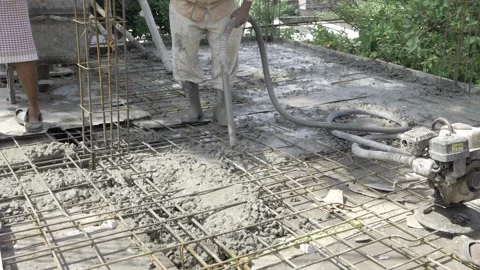 Expert Cement Laying in Progress - Enhancing Structure Integrity Stock Footage 324026082