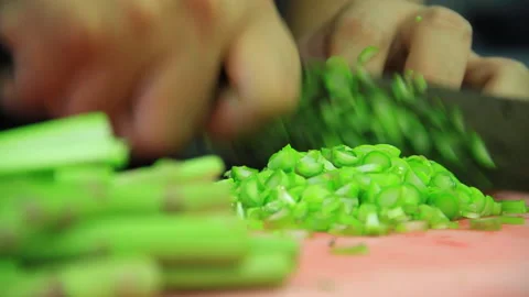 Expert chef hands cutting vegetables detail shot Stock Footage 139106241