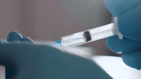 Expert correctly administers medication. Certified healthcare staff precisely Video stock 337548908