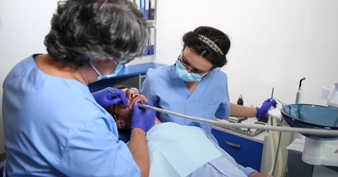 Expert Dentist Man Drill Teeth Mouth Open Therapy Procedure at Dentistry Clinic Stock-Footage 70685236