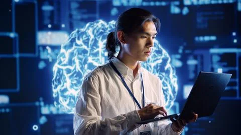 Expert doing AI simulation on laptop Stock Photos